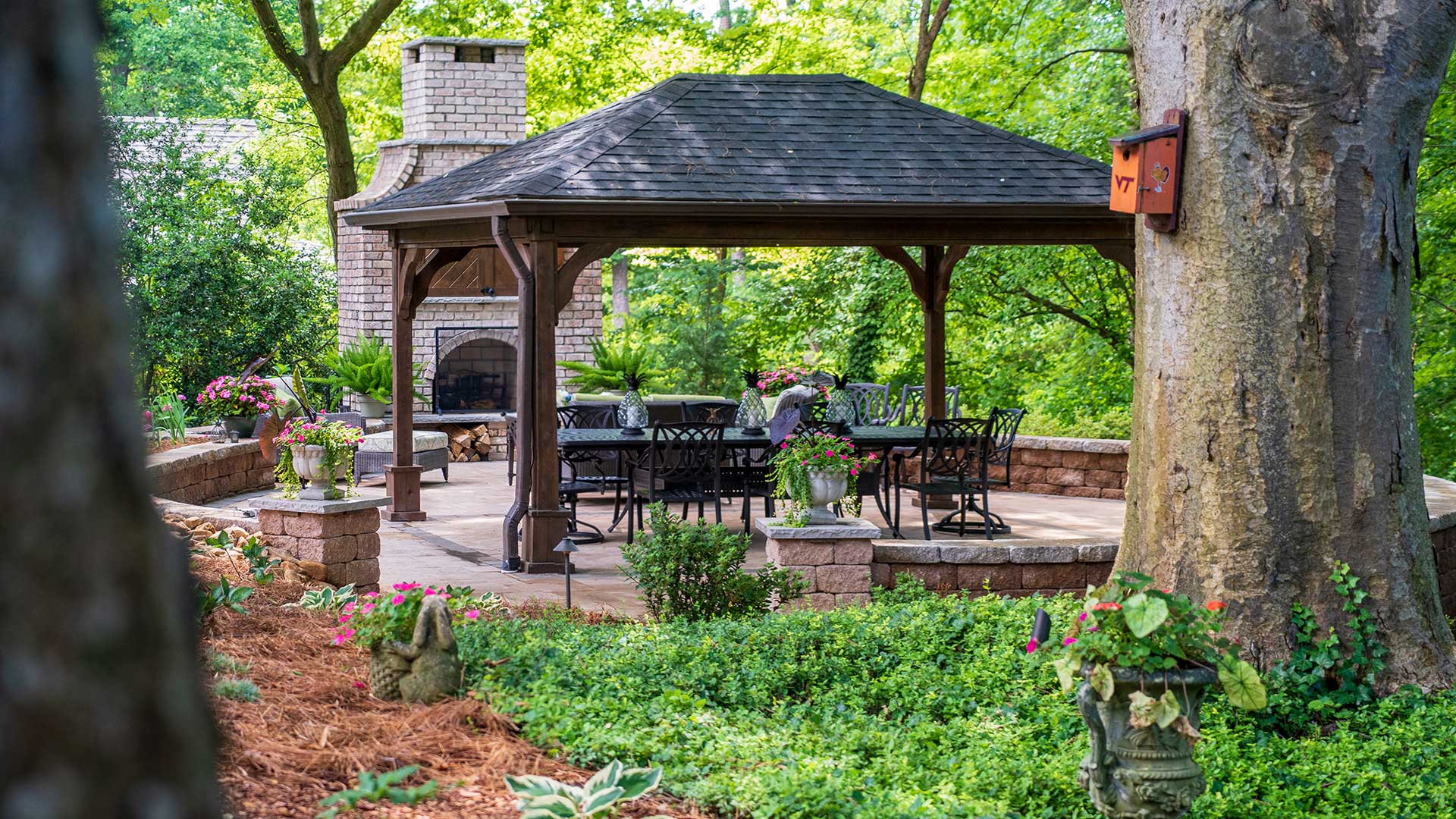 Custom patio with pavilion and outdoor fireplace in Greensboro, NC.
