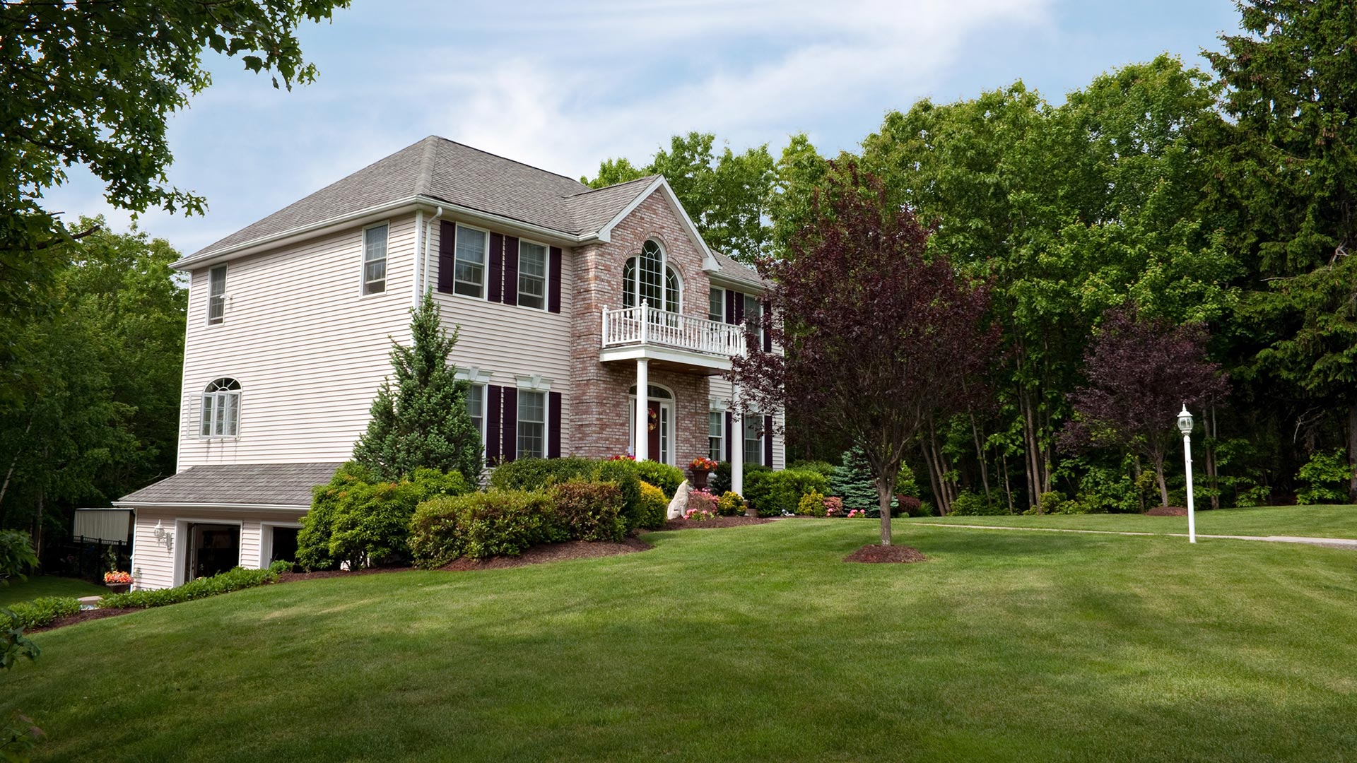 A home with regular lawn care and landscaping in Mebane, NC. 