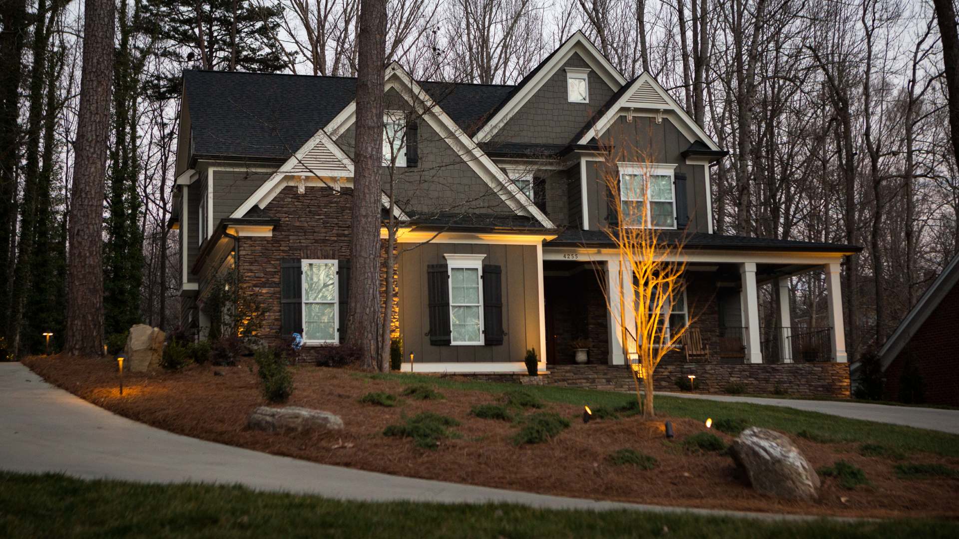 Home landscape with lighting enhancements in Jamestown, NC.