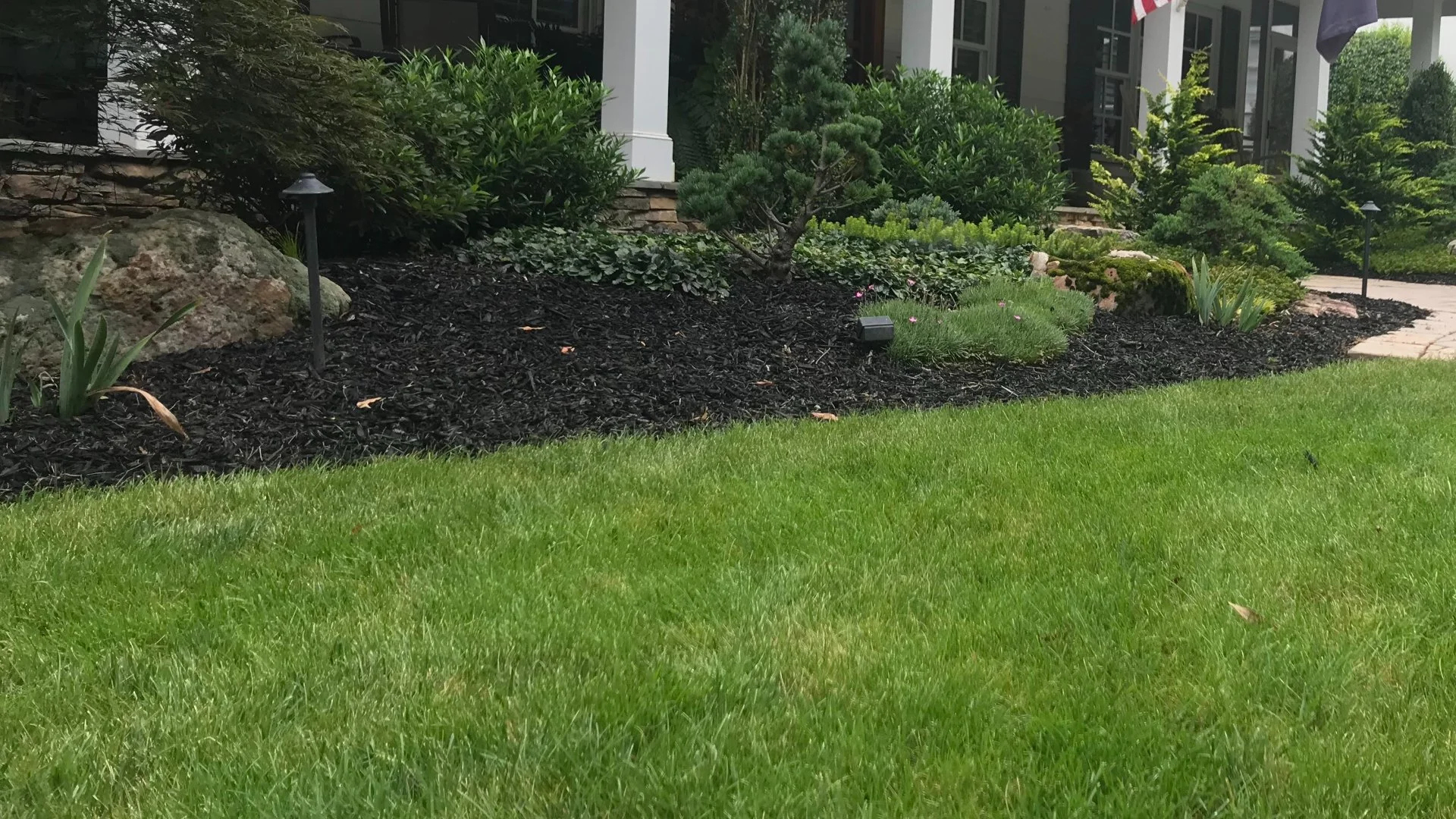 Should You Use a Mulch or Rock Ground Cover in Your Landscape Beds?