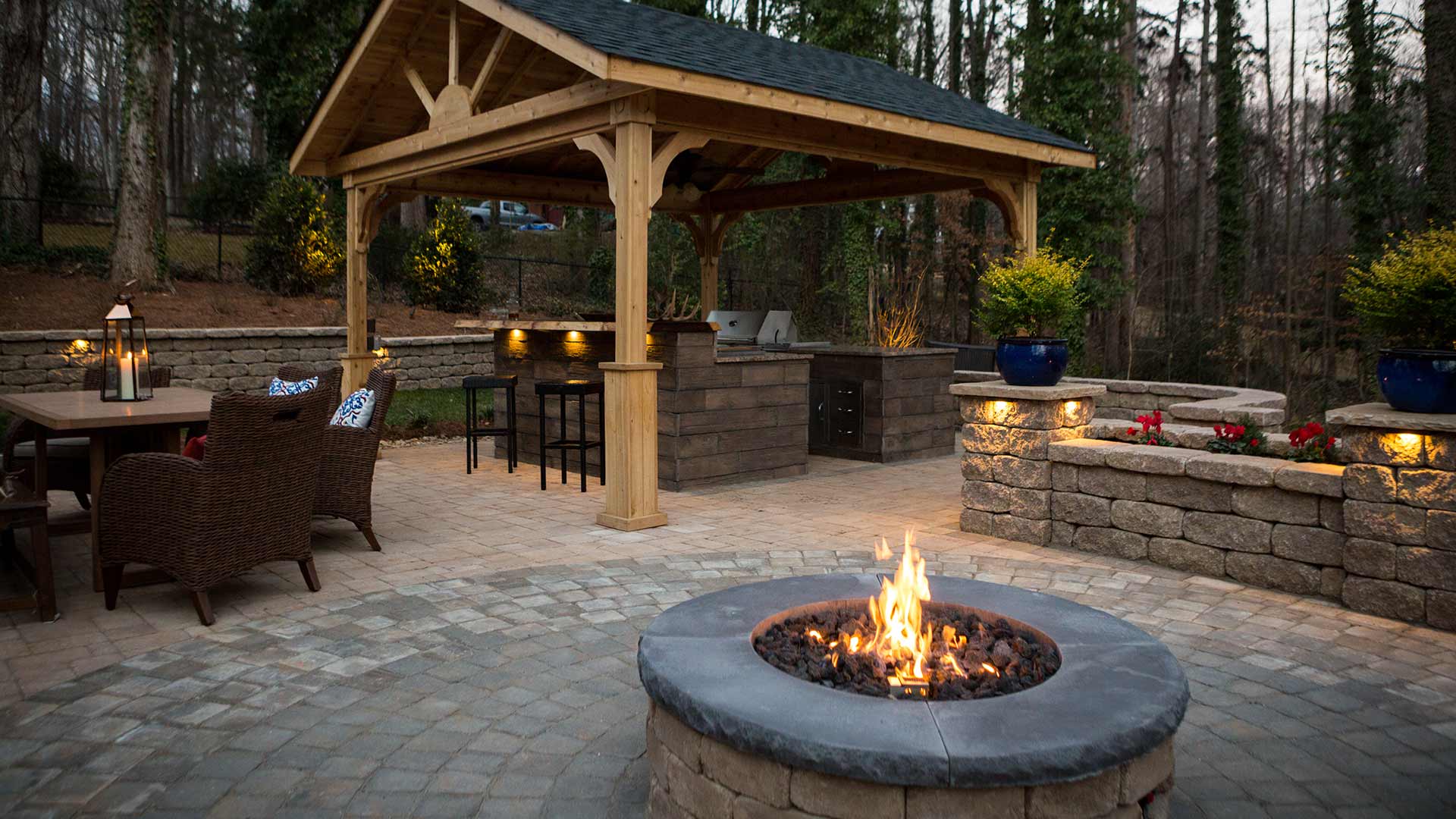 Outdoor living area with custom paver patio and pavilion construction near Winston-Salem, NC.