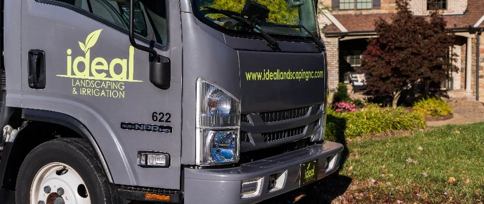 Professional lawn care service truck in Greensboro, NC.