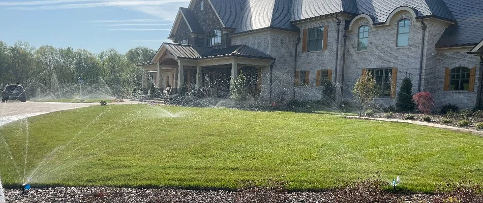 Property in Greensboro, NC, with irrigation system on.