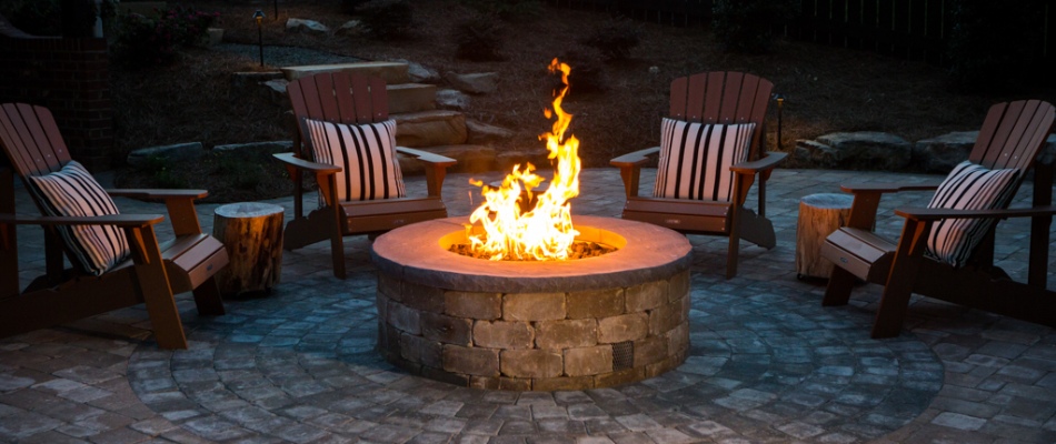 Seating around a fired gas fired pit custom built in Greensboro, NC.