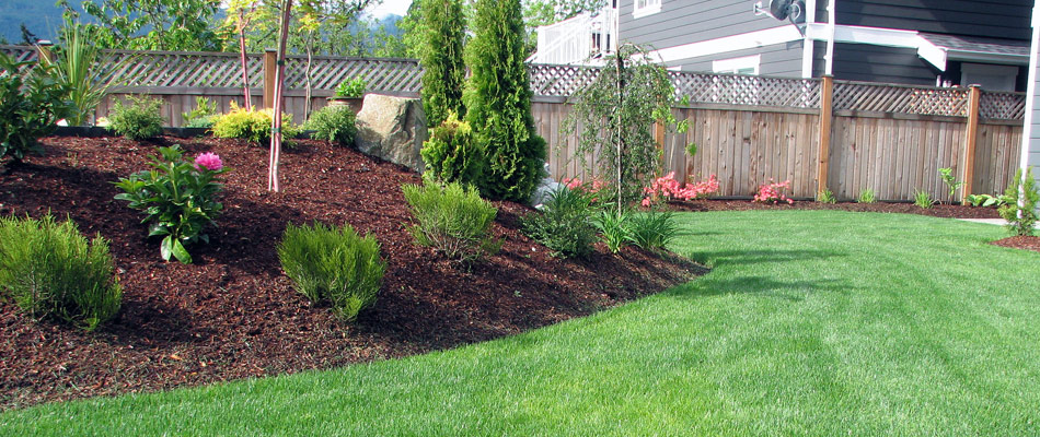Spring yard cleanup performed for landscape bed and lawn in Greensboro, NC.