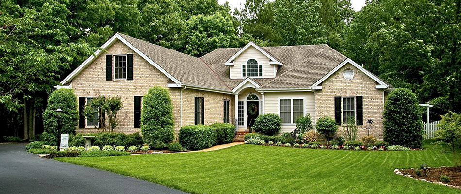 Prestine lawn and landscape shrubs at a home near Randleman, NC.