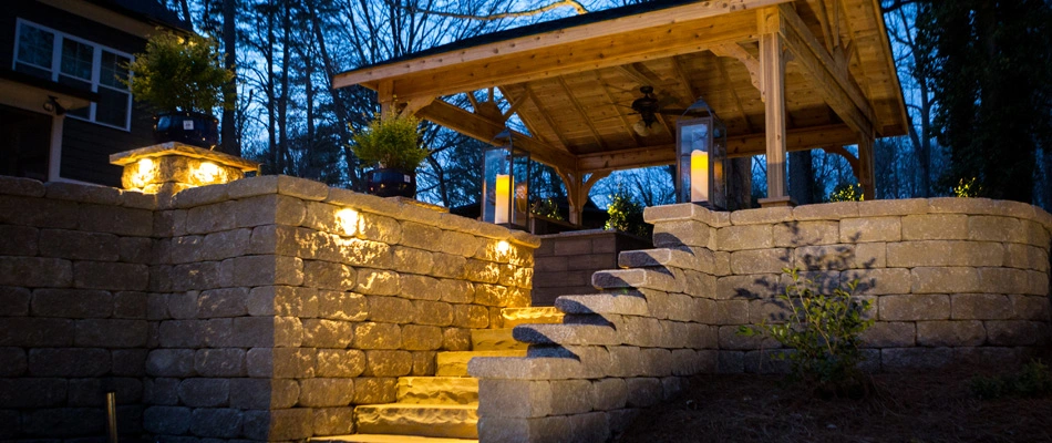Landscape lighting installed beside outdoor steps in Greensboro, NC.