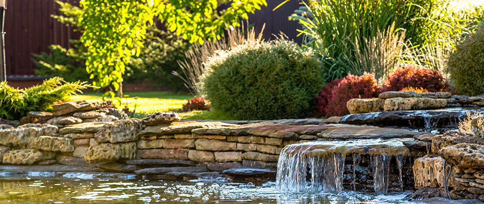 Pond water feature installed in landscaping in Walkertown, NC.