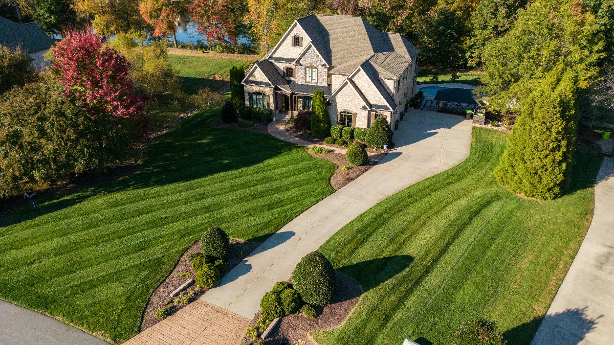 Landscape Construction in Kernersville, NC With a Pool Deck, Firepit ...