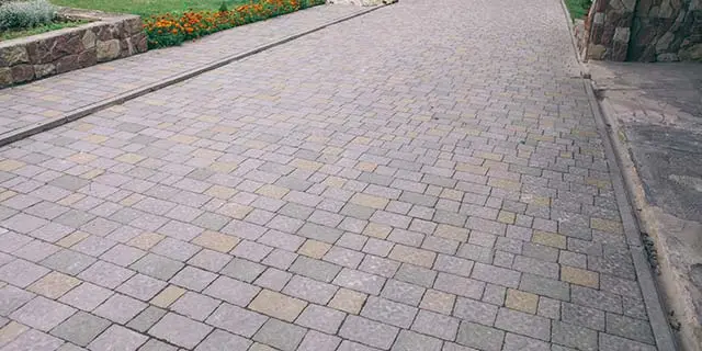 Custom paver driveway installed at a home in Greensboro, NC.